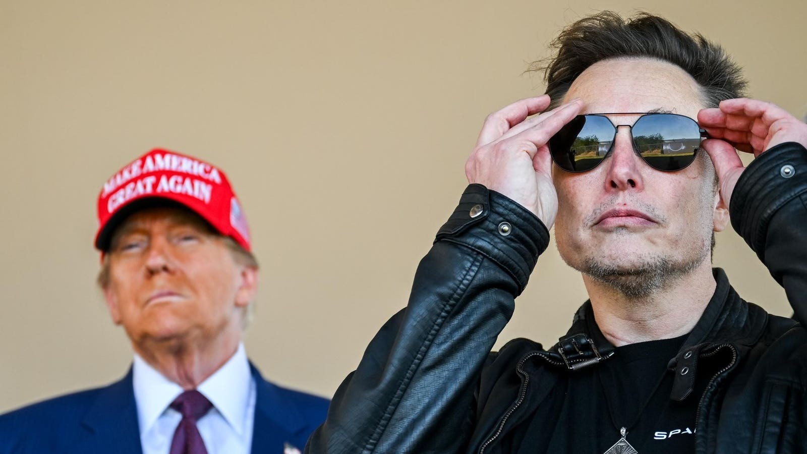 HT6. AI video of Trump kissing Musk’s feet plays inside HUD building –